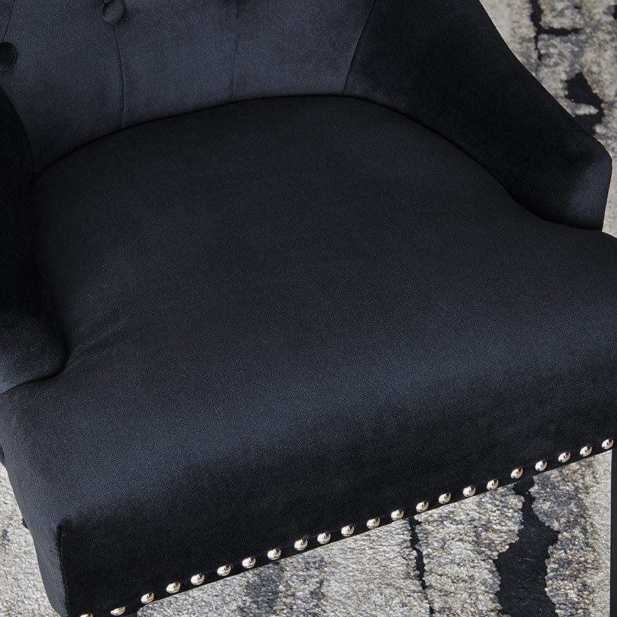 DERRYS Black Studded Lion Dining Chair With Statement Silver Lion Appliqué