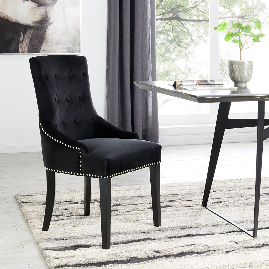 DERRYS Black Studded Lion Dining Chair With Statement Silver Lion Appliqué